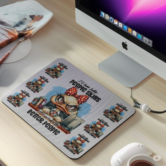 Mouse pad with cartoon character design on a desk next to a computer monitor.